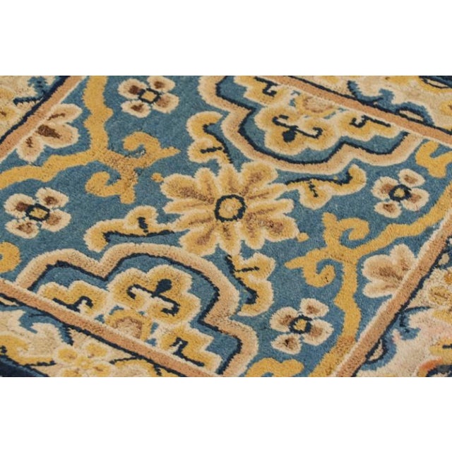 This rare 2x2 antique Ningxia rug—hand-knotted in wool and originating from China circa 1920-1930—is from our very special...