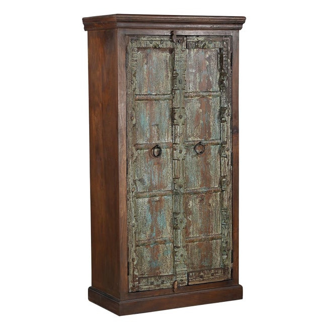 Dimensions: 35"W X 16"D X 67"H Features: • Antique teak wood doors repurposed • 100% solid wood construction • Mango wood...