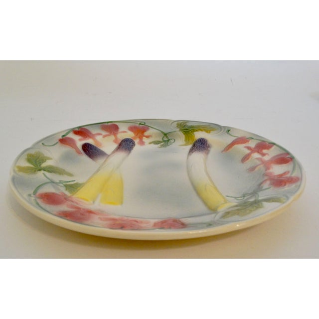 Lovely French K & G St. Clement asparagus wall plate. This majolica plate has pretty spears of asparagus with purple tips...