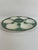 A beautiful classic French Longchamp glazed majolica oyster plate with a vibrant green basket weave background and brown...
