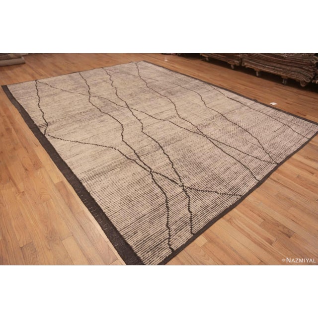 A Truly Fascinating Cream Color Background With A Tribal Nomadic Abstract Modern Room Size Area Rug, Country of Origin:...