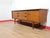 Discover timeless elegance with our exquisite beautiful sideboard by British firm Younger designed by John Herbert in the...