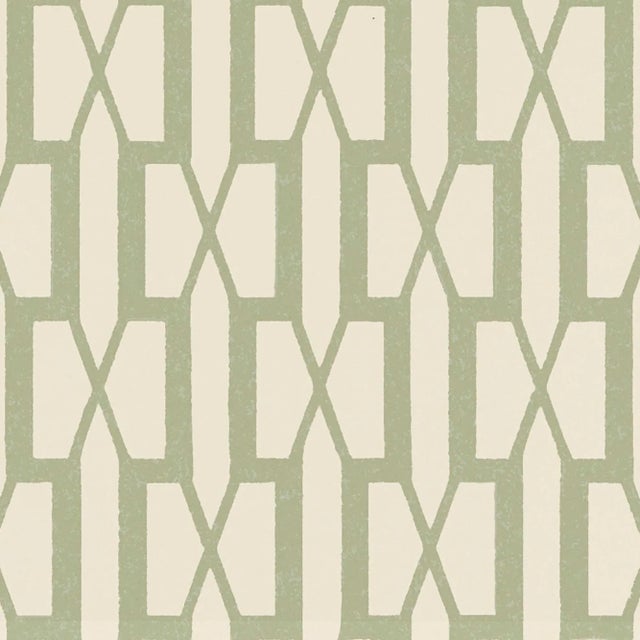 An updated trellis pattern that's handsome yet delicate. This pattern is available as a fabric and a wallcovering....