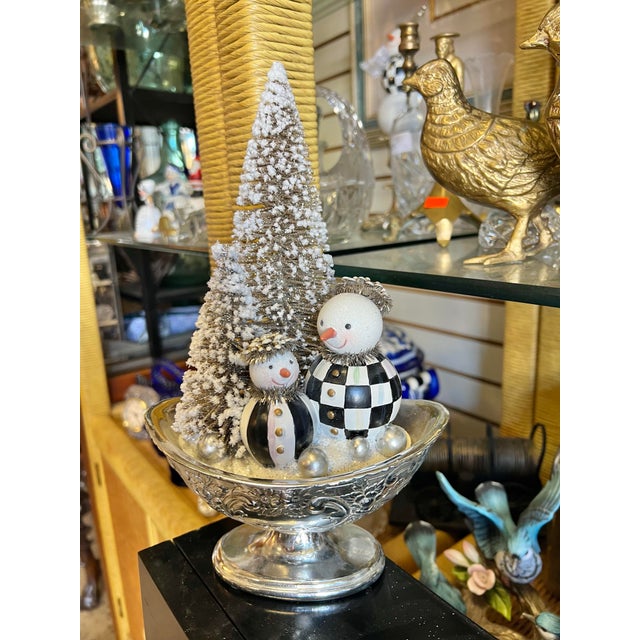 The Vintage Silver Snowmen Arrangement is snow much fun! These frosty friends, decorated with hand-painted Courtly Checks®...