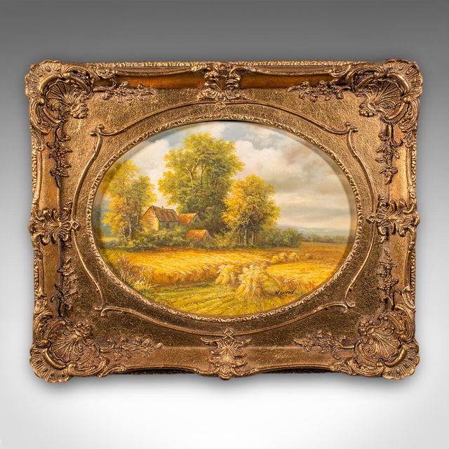 This is a vintage landscape painting. An English School, oil on board rural harvest field scene, dating to the mid 20th...