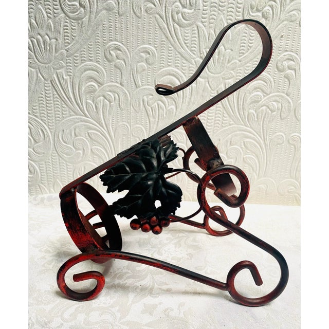 A beautiful Red and Black vintage 1960’s grapes and leaves design wine bottle holder. The wine bottle is not included,...