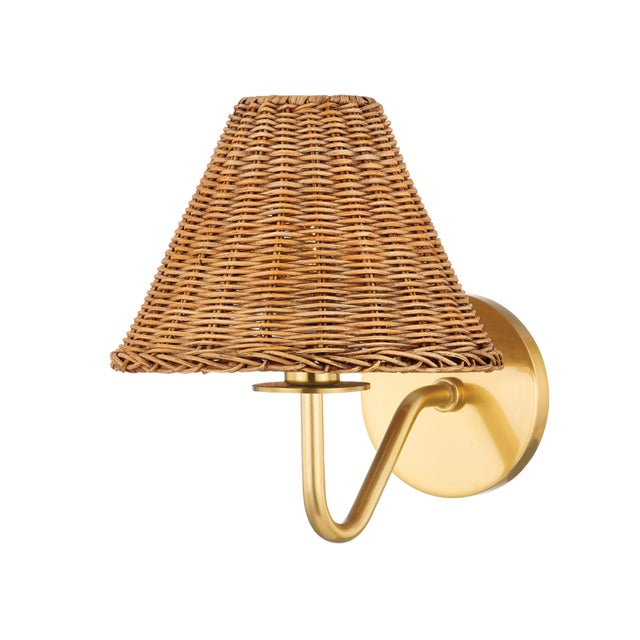 Issa has a natural style that's ahead of the curve. Slender, hooked arms hold a woven rattan shade that lets a soft light...