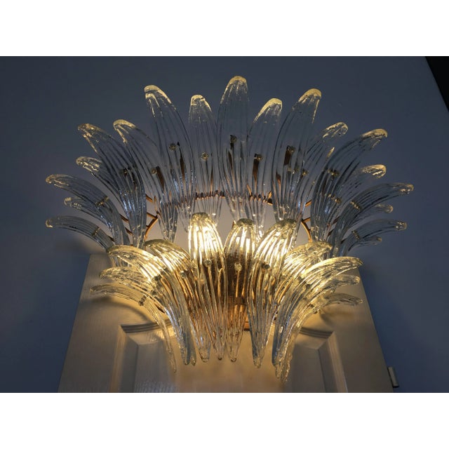 The sconces and chandeliers were located in the hall of a big hotel on the Amalfi Coast. Each individual sconce is...