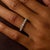 This elegant Lugano eternity band showcases a refined row of 20 emerald cut diamonds totaling approximately 2.00 carats,...