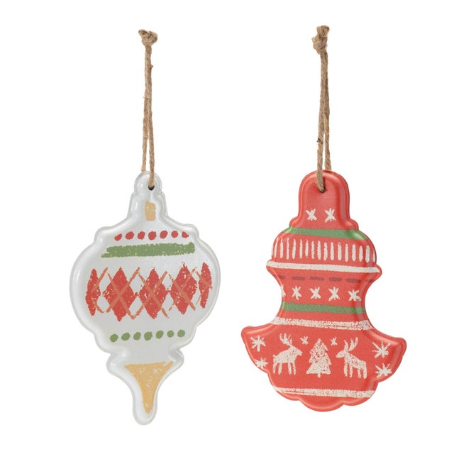 Celebrate the season with these charming Metal Ornaments featuring traditional Nordic patterns. With festive red and white...