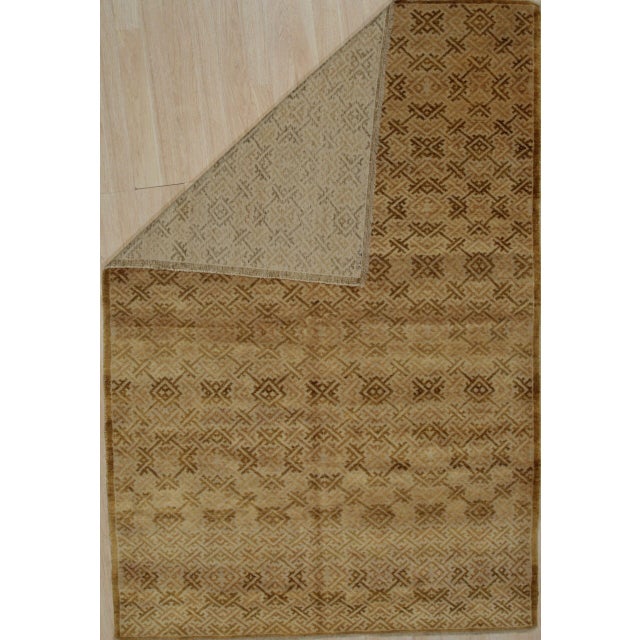 Willow Opulent Yellow Hand Knotted Wool Rug, Country of Origin: China. This exceptional piece features a dense, all-over...