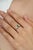 Crafted in 925 sterling silver, this elegant ring features four oval-cut emeralds totaling 0.96 carats, accented by...
