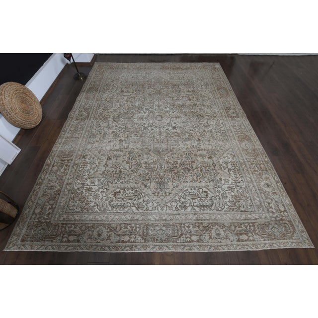 Vintage Persian Hand-Knotted area rug is a semi-antique vintage area rug. The '70s Eastern region of Anatolian's unique...