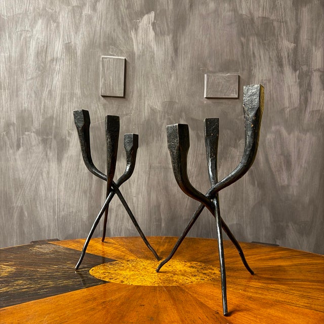 Pair of sculptural three arm hand forged iron brutalist candle holder candelabras. CANDLE HOLDER A - Dimensions: 14.75" H...