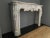A large and very fine quality Louis XV style fire place in Carrara marble. The profusely carved frieze, protruding from...