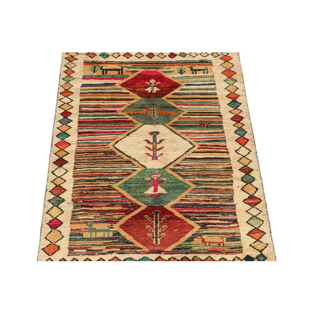 Tribal 1950s Vintage Persian Tribal Rug in Vibrant Colors With Pictorial Medallions by Rug & Kilim For Sale - Image 3 of 8