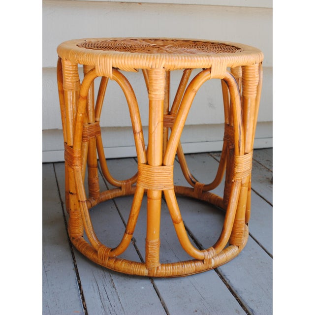 This mid century round wicker table is very versitle. It can be used in almost every room for an extra accent table. It is...