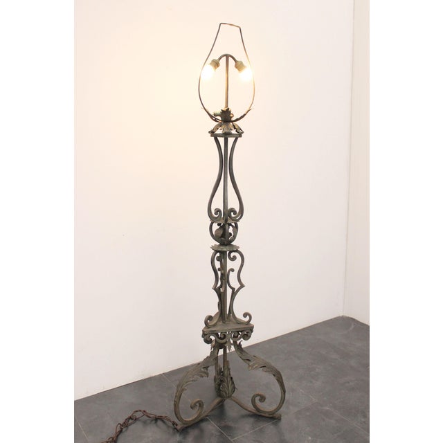 Masterfully performed iron floor performed, the forged body with a square profile of generous thickness are covered with...