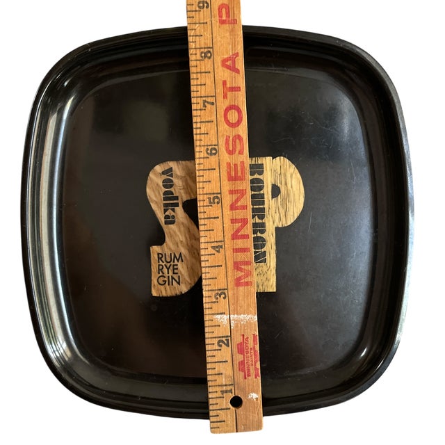 Mid-century cocktail tray by Couroc of Monterey featuring the “SIP” motif, spelled out in a vibrant inlay of various wood...