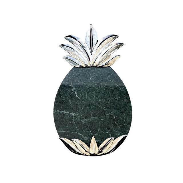 Elegant marble charcuterie serving set featuring a decorative pineapple-shaped tray with matching dark marble cheese...