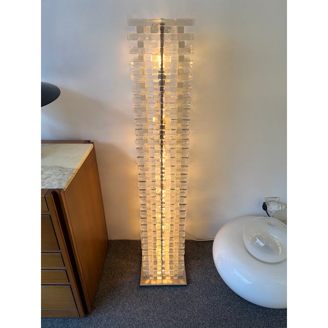 Rare Mid-Century Modern space age tower floor lamp design by the Italian design manufacture Poliarte. Pressed glass clear...