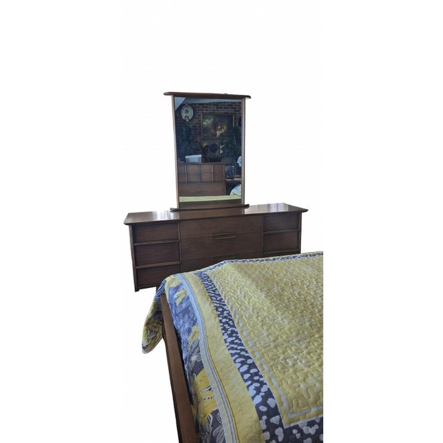 A complete and beautifully preserved Kent Coffey “Eloquence” bedroom suite in rich walnut, dating to the 1960s. This...