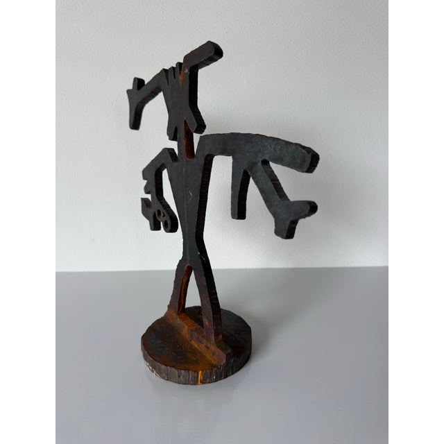 Powerful and expressive vintage abstract sculpture crafted in the 1990s, executed in hand-cut steel with a strong...