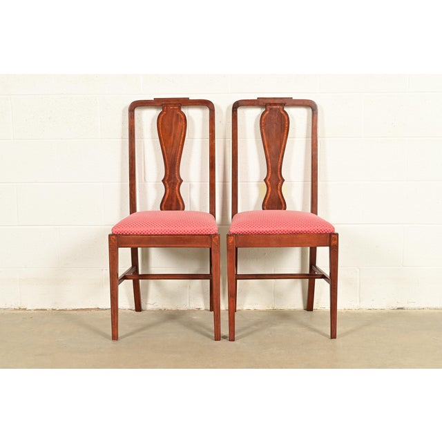 A gorgeous pair of Federal or Hepplewhite style side chairs or dining chairs In the manner of Baker Furniture USA, Circa...