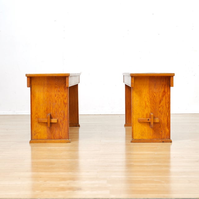 This fantastic pair of vintage benches were produced in England. With excellent construction they are made from pine with...