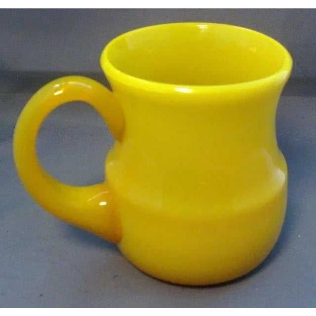 A beautiful Chinese Peking glass mug or tankard of baluster shape with an applied handle and polished pontil. Heavy weight...