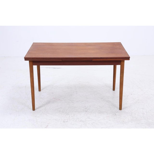 Wonderful Extendable Vintage Dining Table from the 1960s Vintage teak kitchen table • 2 integrated extension leaves on the...