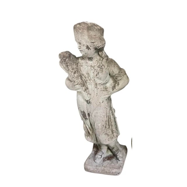 Embodying the timeless charm of classic European estate design, this vintage cast stone garden statue beautifully captures...
