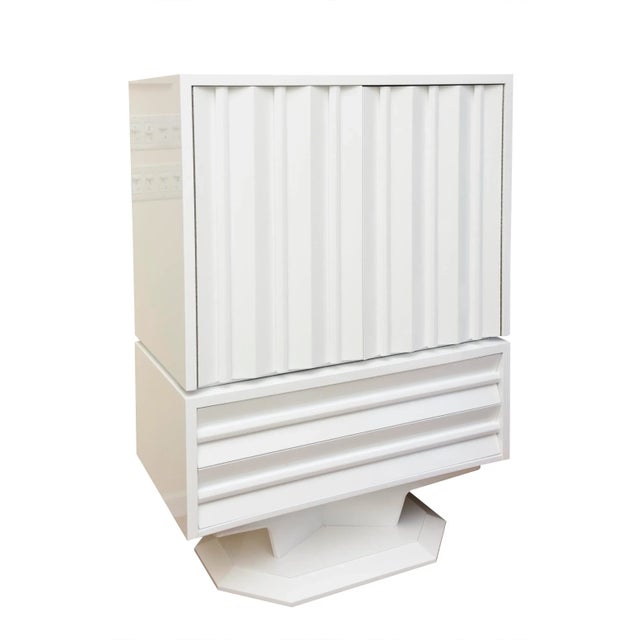 This amazing sculptural and brutalist vintage cabinet/ dresser/gentlemen's dresser/ dry bar has been restored with high...