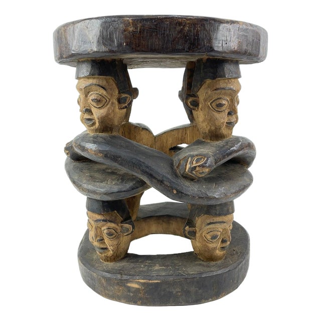 Early 20th Century Bamileke Eight Faces Wooden Stool Cameroon For Sale