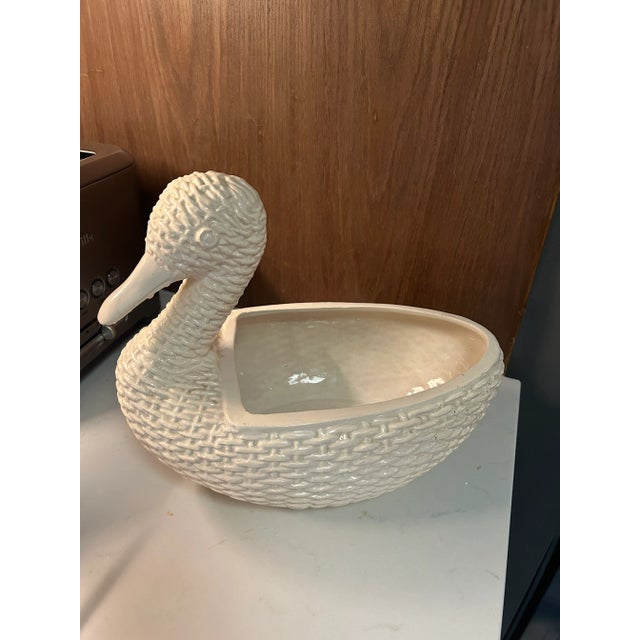 Perfect for festive dinners! Casually elegant, this white ceramic wicker tureen shaped like a duck floating on water will...