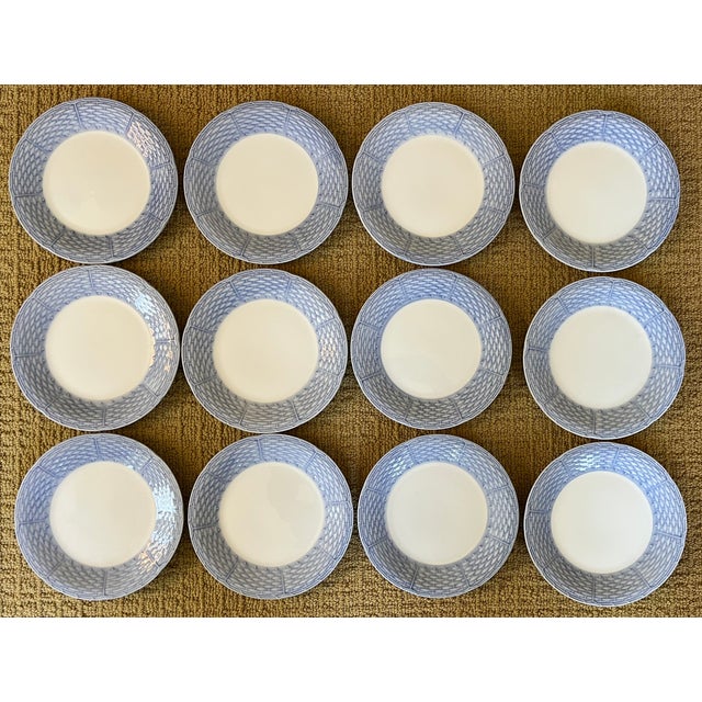 Set 12 English porcelain blue and white plates for salad, cake or hors d'oeuvres. Decorated with a relief molded...
