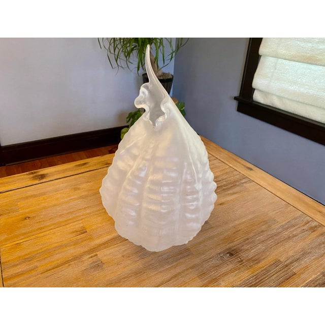 This limited edition glass sculpture by Nikolas Weinstein is one of the last of a collection that was sold out...