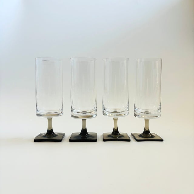 A set of 4 Mid Century wine glasses from "Linear Smoke" line by Rosenthal, produced between 1963 to 1982. Clear...