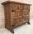 About From Northern Spain, constructed of solid walnut, the rectangular top with molded edge atop a conforming case...