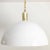 1970s modern minimalist domed white acrylic pendant light by Artcraft Montreal simply topped by a gold metal cap....