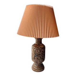 1960s-1970s West German Fat Lava Ceramic Table Lamp, Applied Scroll Relief, Volcanic Drip Glaze in Brown, Black and Orange For Sale