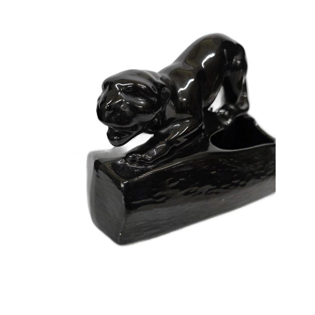 An American Mid-Century icon — this 1950s black ceramic panther TV lamp is bold, glossy, and full of attitude. Once found...