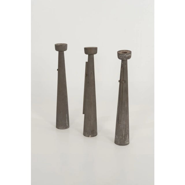 Paul Evans Rare and Early Candlesticks, Set of Three, 1953 Sandblasted pewter Each: 20½ h × 3¼ dia in (52 × 8 cm)...
