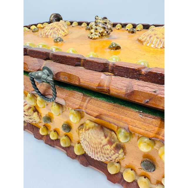 Vintage Wooden Shell-Adorned Trinket or Jewelry Box Exterior Design: • Material: The base structure is crafted from wood,...