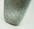 A beautifully shaped and elegant ceramic vase with a semi-matte glaze in different shades of gray and brown, designed by...