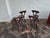 Set of 4 hand-crafted Brutalist elm chairs in the style of Alexandre Noll, France 1950s. 2 of the chairs are tripod...
