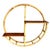 Beautifully restored Mid-century era circular "Skeleton" shelf crafted from a steam bent rattan frame with a central...