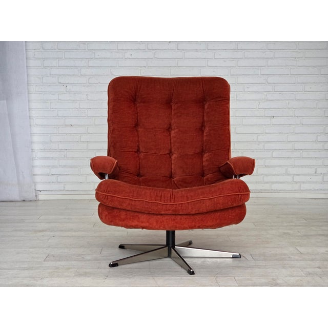 1970s, Swedish swivel armchair by Ulferts Sweden. Original dark orange furniture velour, five fingers chrome steel base....