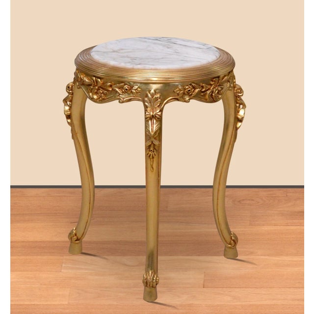 Beautiful small round Louis XVI white marble top table gilded with real gold leaves hand crafted real beechwood....