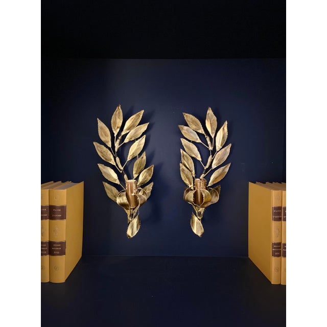 Two laurel leaf wall lights in gold metal "maison florart". hanging system on the back (last photo). in very good...